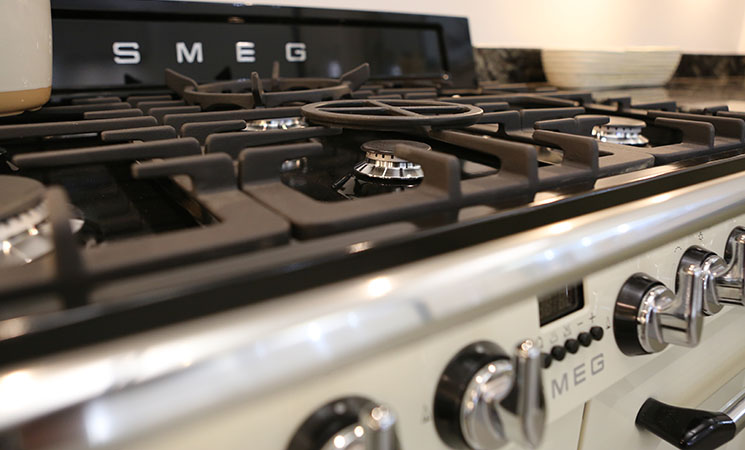 Smeg Cream Range Cooker in a fitted kitchen 
