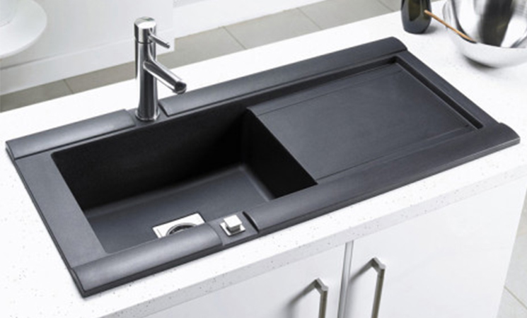 Rectangular black composite sink and drainer for a modern sleek look 