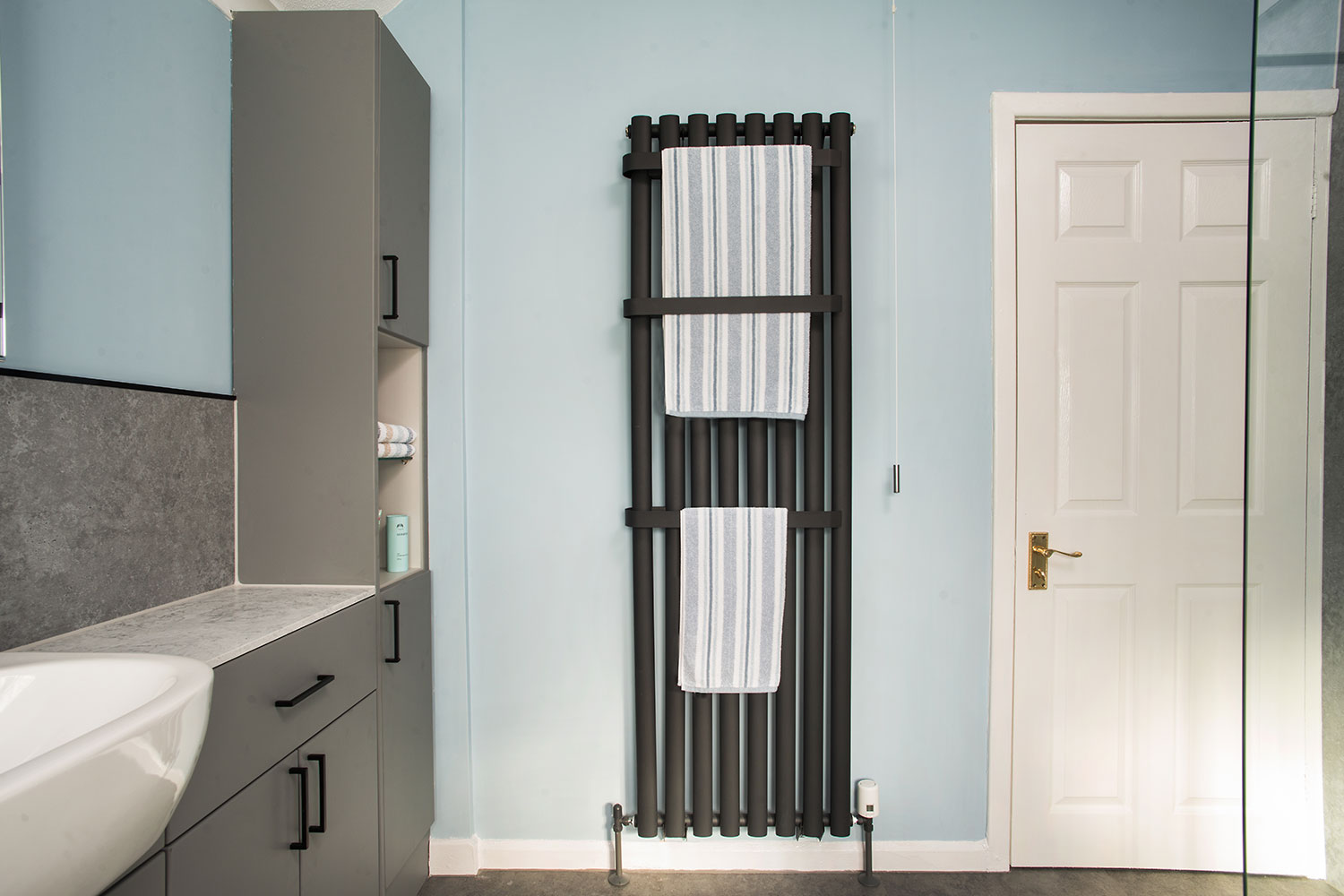 Matt black wall mounted towel rail