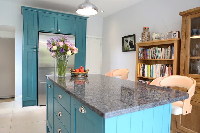 Teal and cream fitted kitchen by Gardiner Haskins 