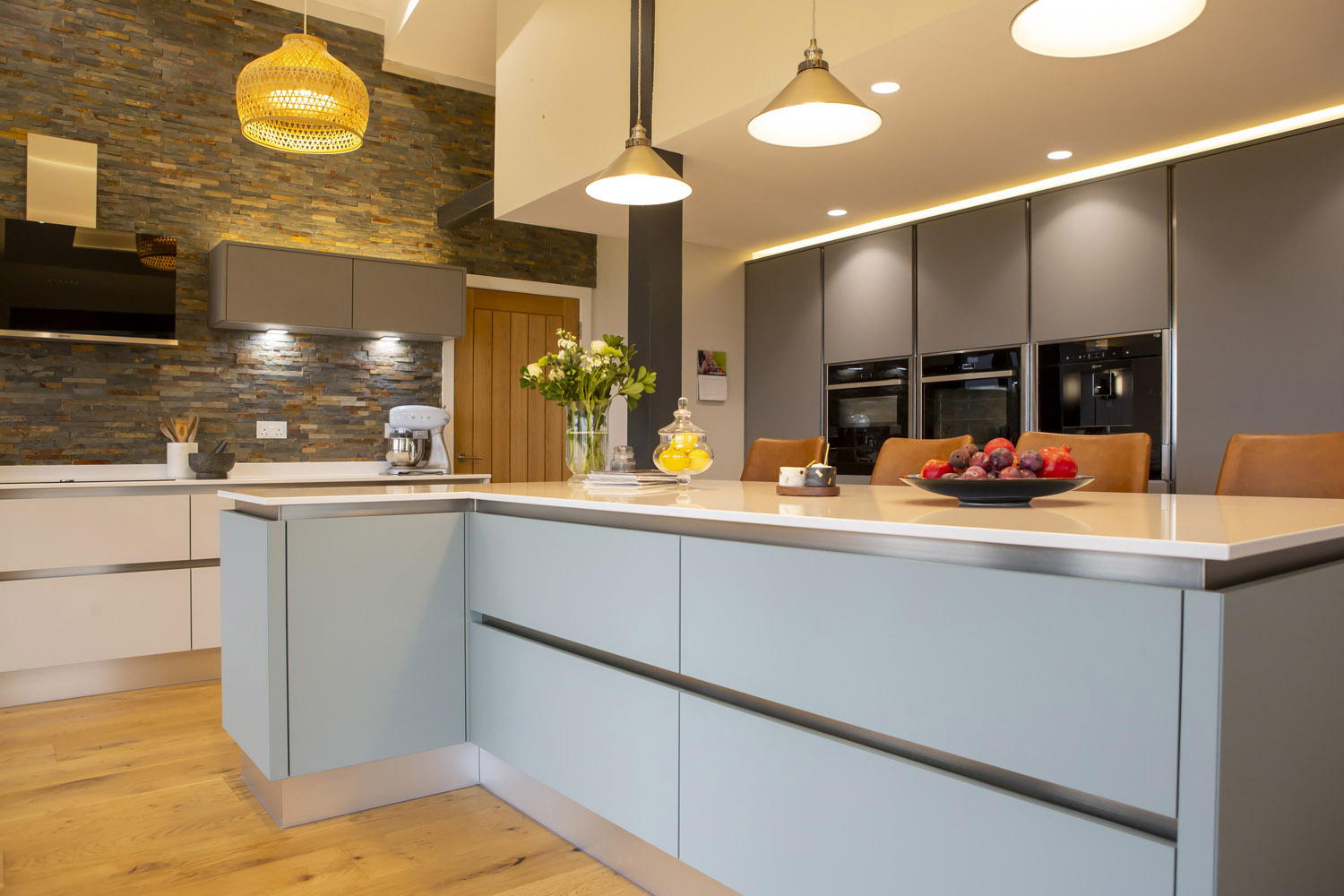 Crown Imperial Fitted kitchen with three tone cabinetry and kitchen island