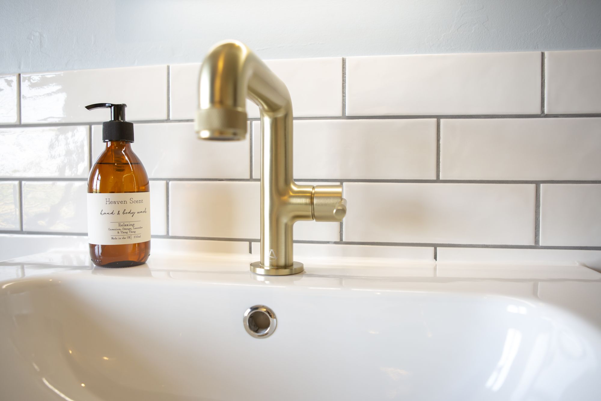 Brass tap fittings on sink from Gardiner Haskins 