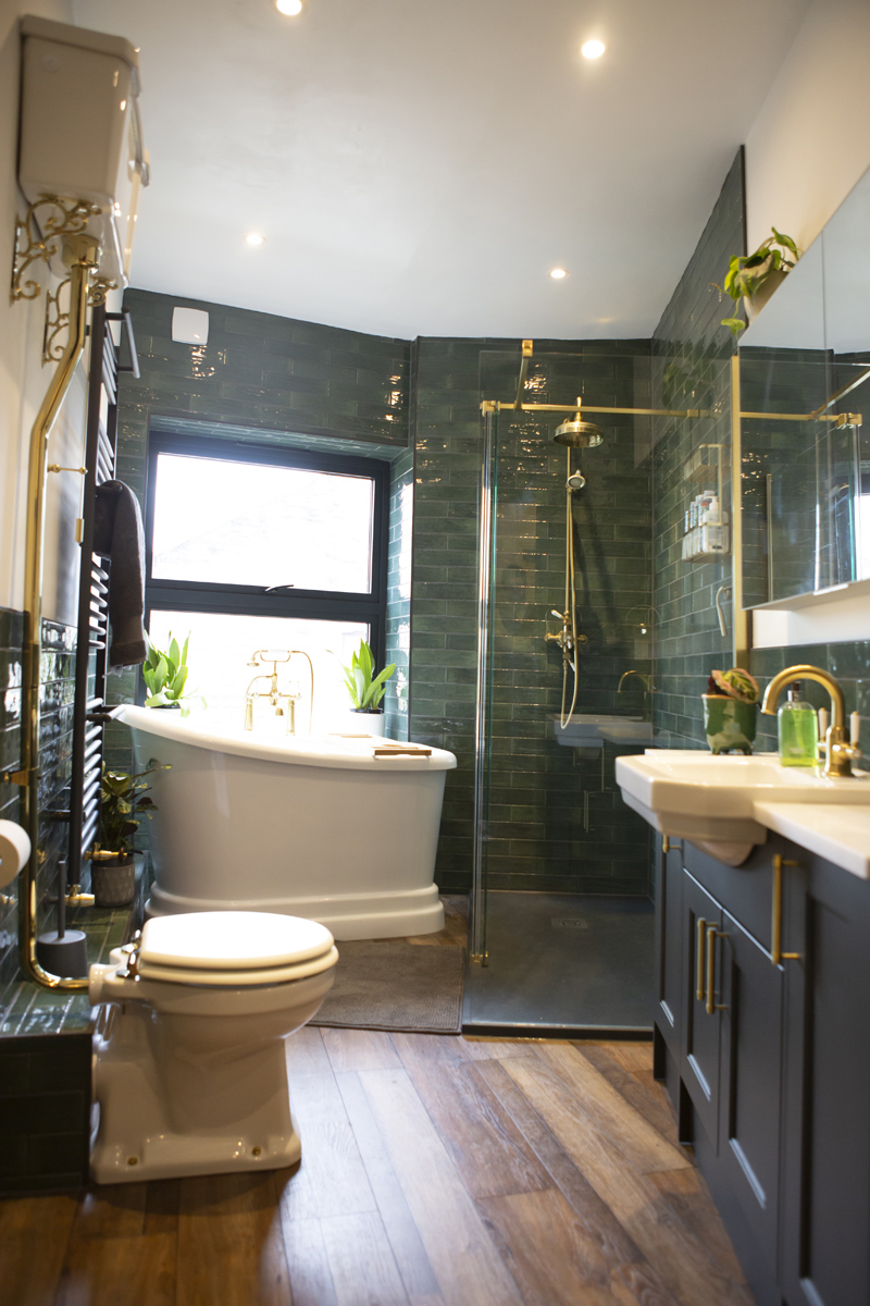 Bathroom in teal green tiling