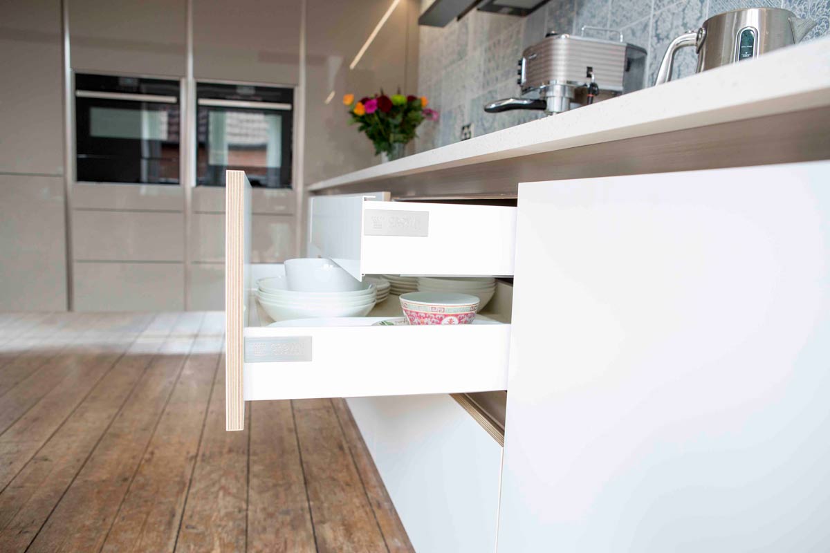 Kitchen Case Study: Crown Imperial Polaris white kitchen drawer cabinets