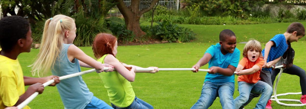 Image of Children Enjoying a Game of Tug of War