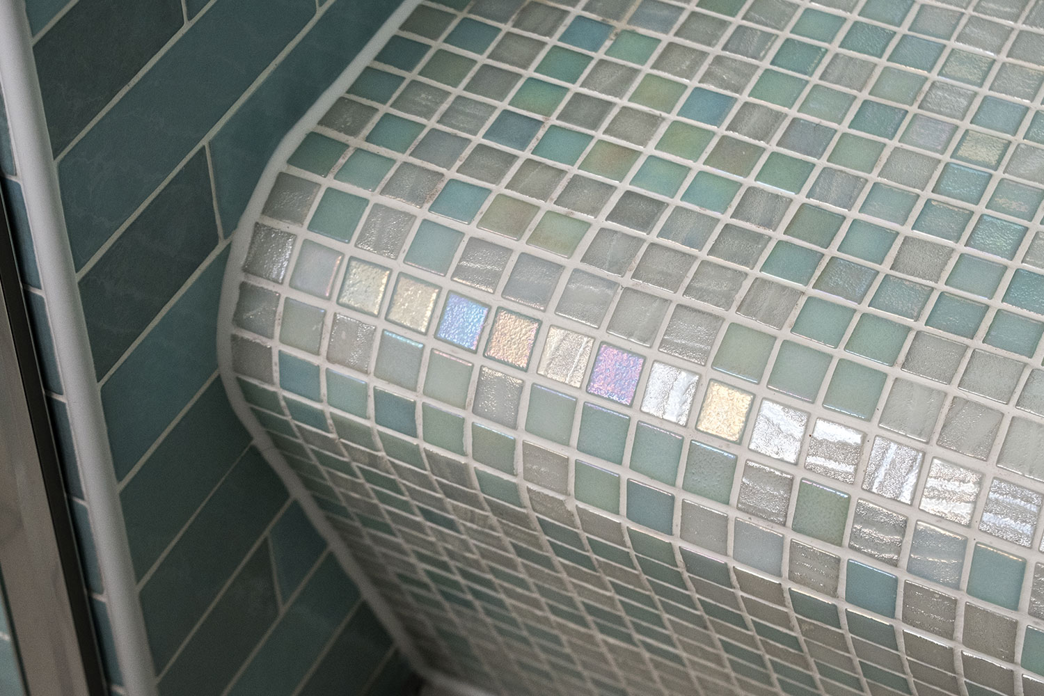 Gorgeous mosaic detail on the wet room shower seat.